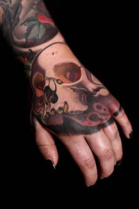 skull on hand tattoo